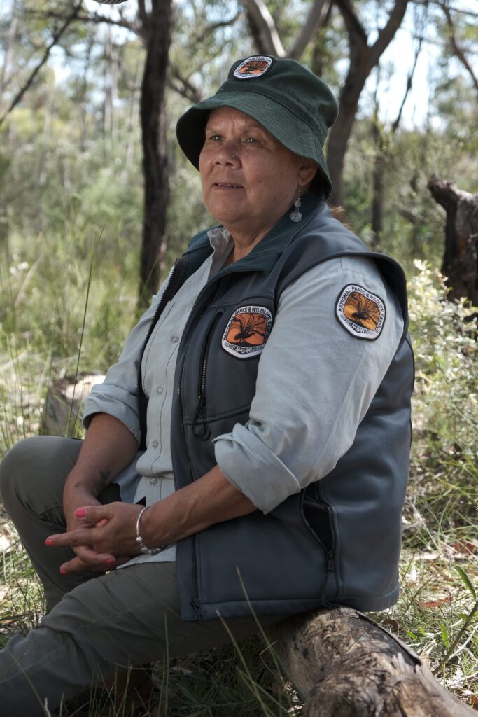 First Nations Aunty posing for a photo in Dharawal National Park Campbelltown